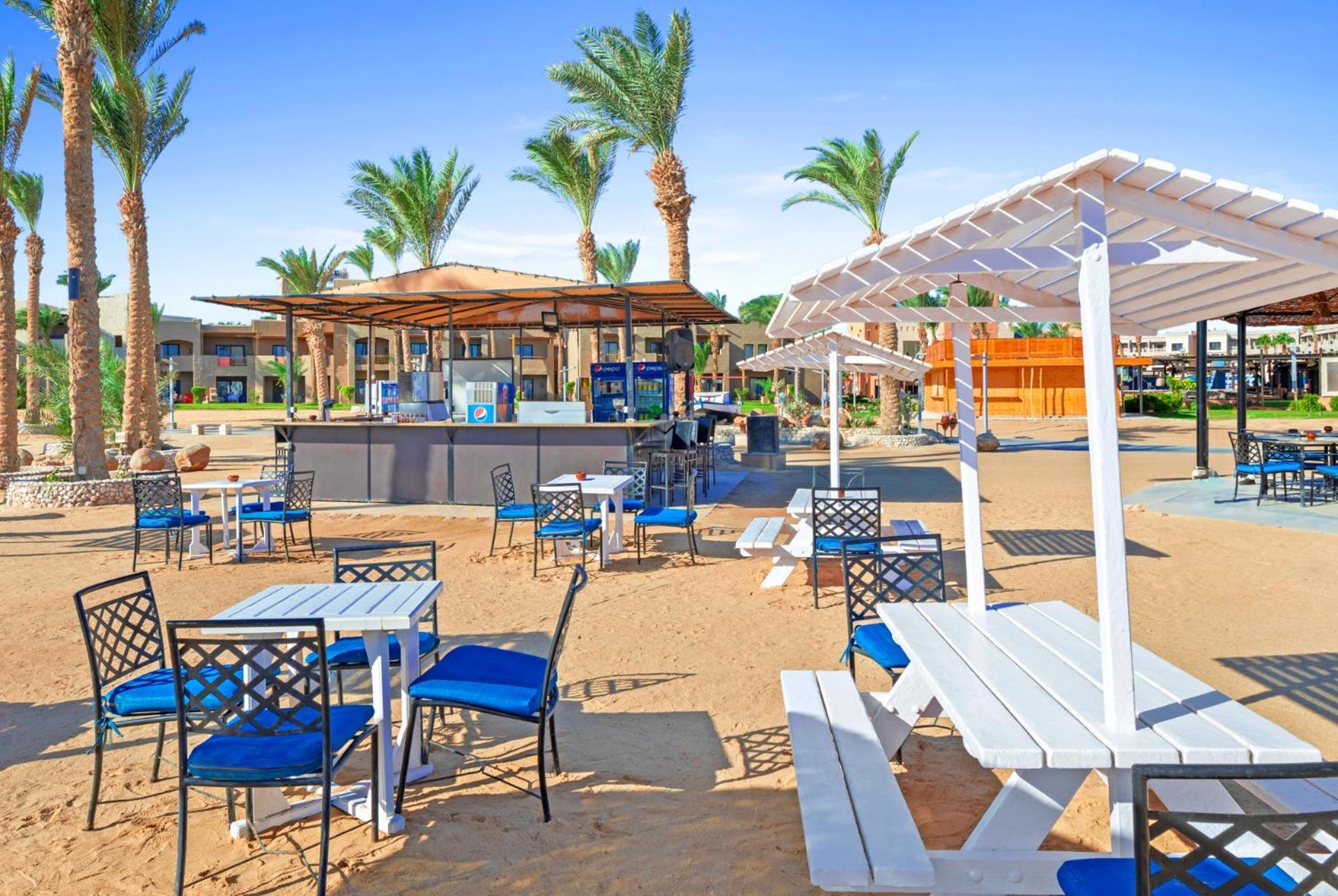 Pickalbatros Sands Port Ghalib Exterior photo Beach bar at a resort in Egypt